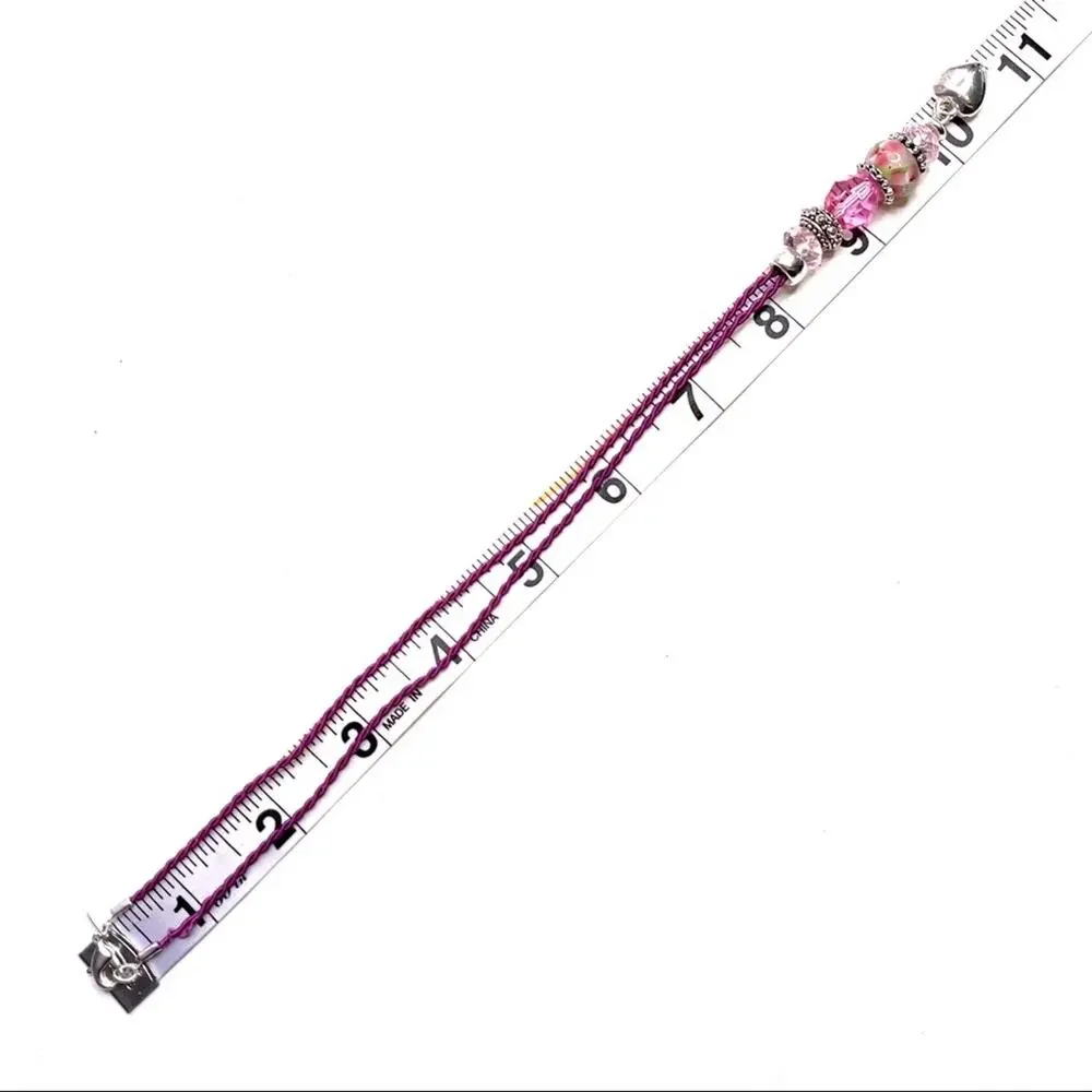 Necklace with heart charm and beads in pink and silver
